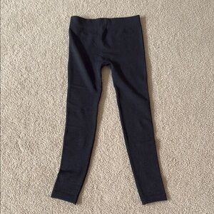 NWOT women’s leggings black.
